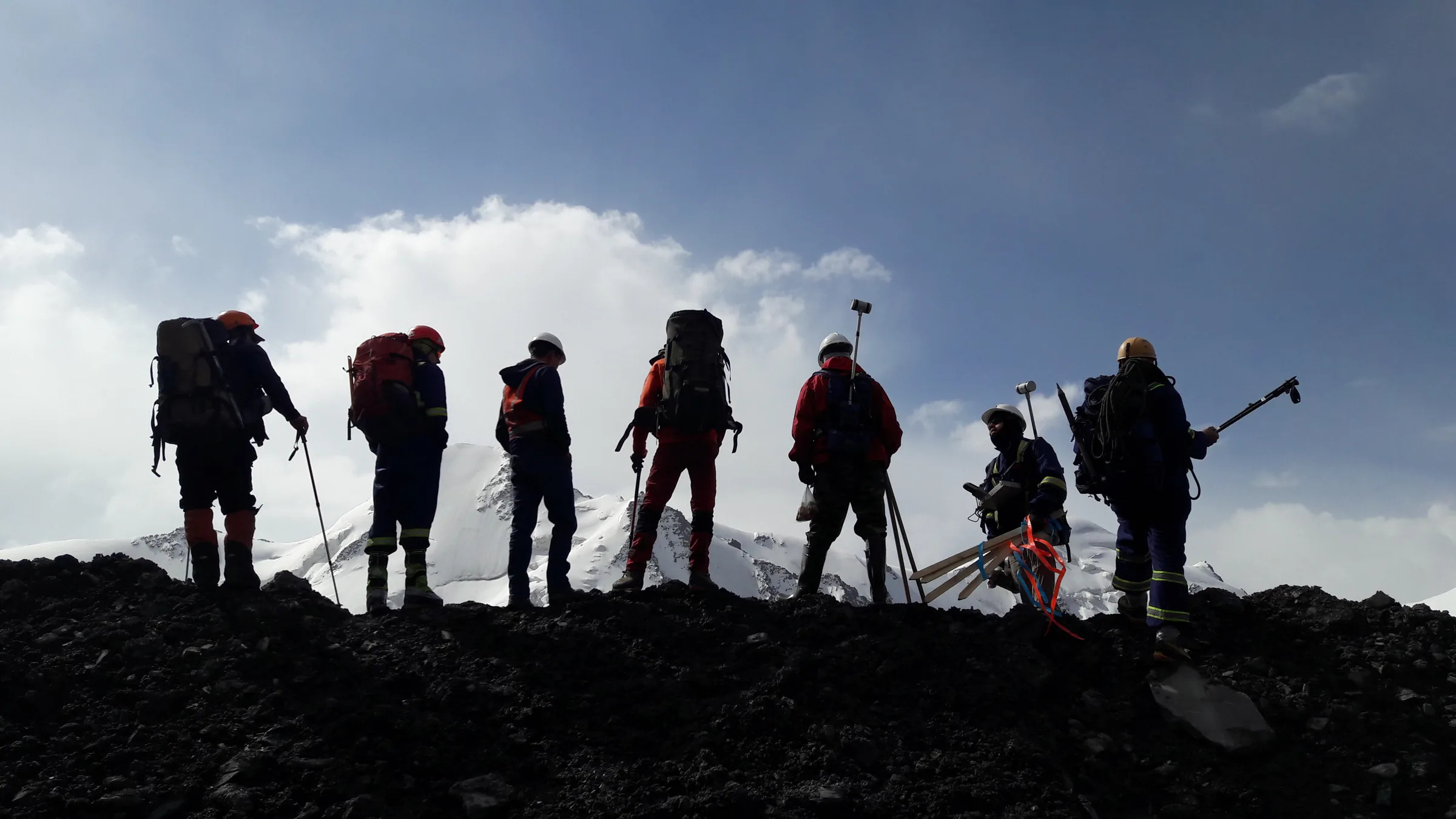 MMapping field team on a ridge during exploration fieldwork